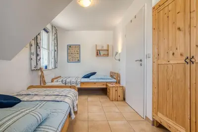 Ein Bett oder Betten in einem Zimmer der Unterkunft Kavelweg 4