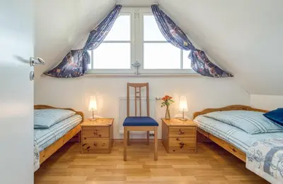 Ein Bett oder Betten in einem Zimmer der Unterkunft Kavelweg 4