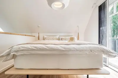 Ein Bett oder Betten in einem Zimmer der Unterkunft Mühlenstraße 13 Whg 2