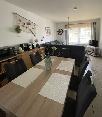 Ein Sitzbereich in der Unterkunft Ferienhaus Strandoase