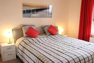 Ein Bett oder Betten in einem Zimmer der Unterkunft Ostseeresidenz - Whg 24