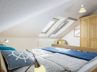 Ein Bett oder Betten in einem Zimmer der Unterkunft Likedeeler Weg 1 Whg 23
