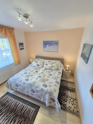 Ein Bett oder Betten in einem Zimmer der Unterkunft Kranichrast 1 Whg 1