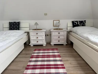 Ein Bett oder Betten in einem Zimmer der Unterkunft Kranichrast 1 Whg 4