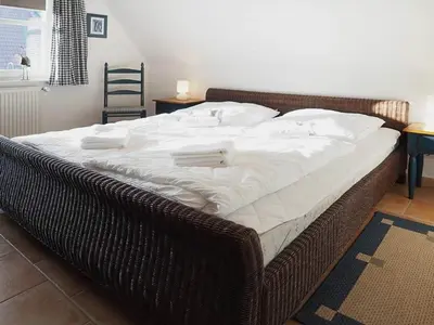 Ein Bett oder Betten in einem Zimmer der Unterkunft Kranichrast 1 Whg 4