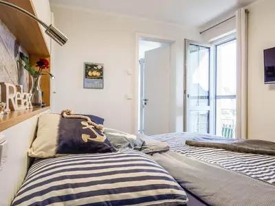 Ein Bett oder Betten in einem Zimmer der Unterkunft Whg 14 - Seesternchen