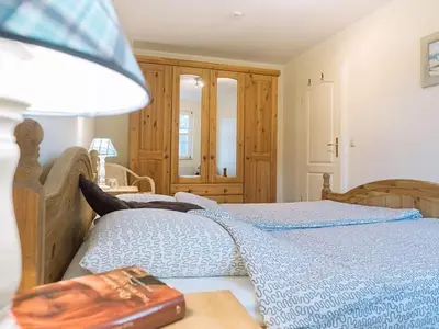 Ein Bett oder Betten in einem Zimmer der Unterkunft Müggenburger Weg 1 Whg 1