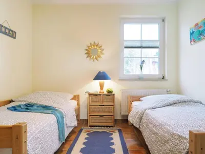 Ein Bett oder Betten in einem Zimmer der Unterkunft Müggenburger Weg 1 Whg 1