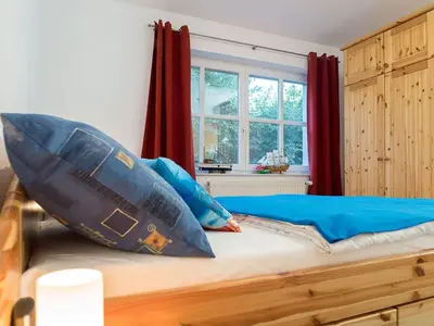 Ein Bett oder Betten in einem Zimmer der Unterkunft Kranichrast 1 Whg 2