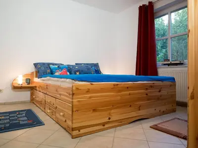 Ein Bett oder Betten in einem Zimmer der Unterkunft Kranichrast 1 Whg 2
