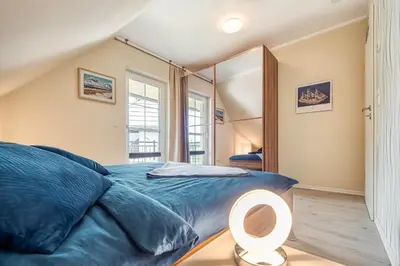 Ein Bett oder Betten in einem Zimmer der Unterkunft Huus Jette