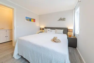 Ein Bett oder Betten in einem Zimmer der Unterkunft Whg 01 - Koje M