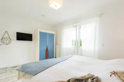 Ein Bett oder Betten in einem Zimmer der Unterkunft Whg 10 - Laura