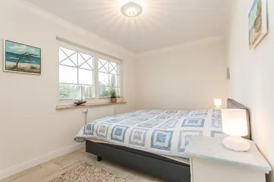Ein Bett oder Betten in einem Zimmer der Unterkunft Beau - Whg 8