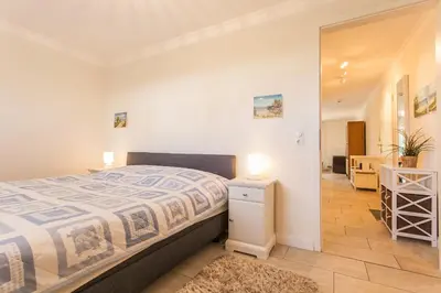 Ein Bett oder Betten in einem Zimmer der Unterkunft Beau - Whg 8