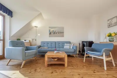 Ein Sitzbereich in der Unterkunft Sommerwind Whg 3