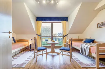 Ein Bett oder Betten in einem Zimmer der Unterkunft Sommerwind Whg 3