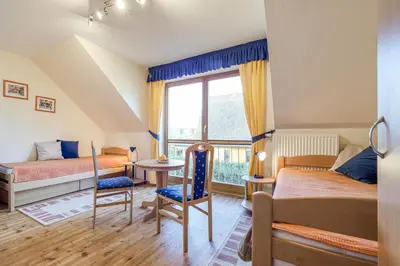 Ein Bett oder Betten in einem Zimmer der Unterkunft Sommerwind Whg 3