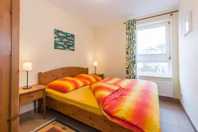Ein Bett oder Betten in einem Zimmer der Unterkunft Ostseeresidenz - Whg 14