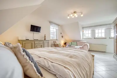 Ein Bett oder Betten in einem Zimmer der Unterkunft Birkenstraße 15c Whg 9