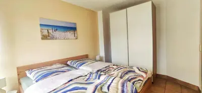 Ein Bett oder Betten in einem Zimmer der Unterkunft Ostseeresidenz - Whg 17