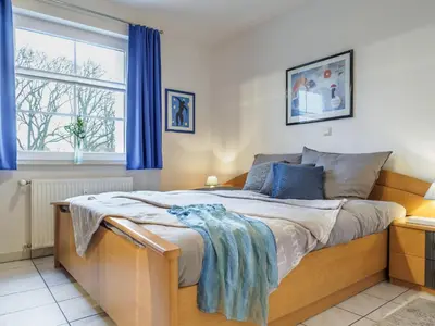 Ein Bett oder Betten in einem Zimmer der Unterkunft Hafenstraße 38 Whg 5