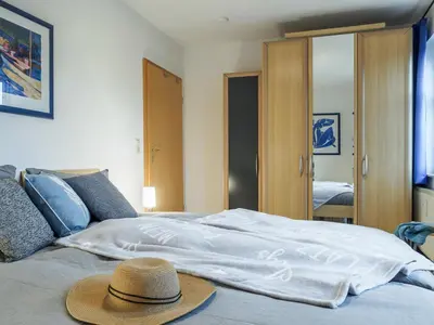 Ein Bett oder Betten in einem Zimmer der Unterkunft Hafenstraße 38 Whg 5
