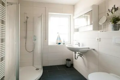 Ein Badezimmer in der Unterkunft Friedenstraße 7 Whg 2