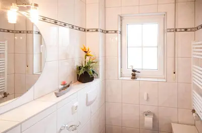 Ein Badezimmer in der Unterkunft Friedenstraße 7 Whg 2
