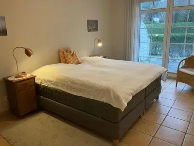 Ein Bett oder Betten in einem Zimmer der Unterkunft Wellnessresidenz Störtebeker - Whg 1