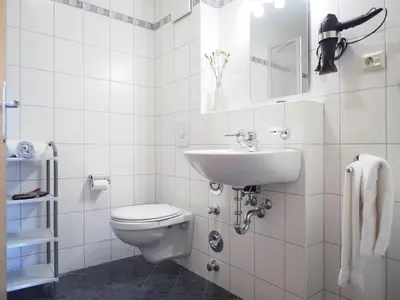Ein Badezimmer in der Unterkunft Alte Reihe 10 - Silbermöwe 1