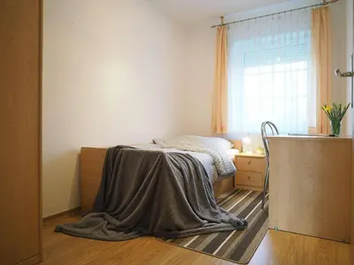 Ein Bett oder Betten in einem Zimmer der Unterkunft Alte Reihe 10 - Silbermöwe 3