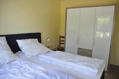 Ein Bett oder Betten in einem Zimmer der Unterkunft Ostseeresidenz - Whg 19