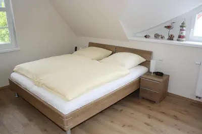 Ein Bett oder Betten in einem Zimmer der Unterkunft FeHa Strandmügge