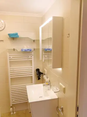 Ein Badezimmer in der Unterkunft Birkenstraße 6i Whg 03