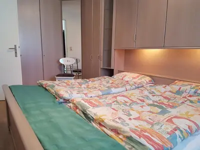 Ein Bett oder Betten in einem Zimmer der Unterkunft Birkenstraße 6i Whg 03