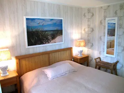 Ein Bett oder Betten in einem Zimmer der Unterkunft Sonneneck - Kavelweg 10 Whg 1