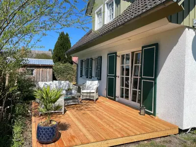 Ein Garten an der Unterkunft Ferienhaus Schiffchen 