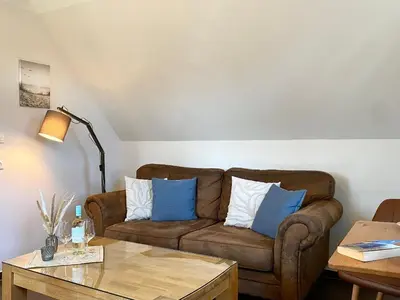 Ein Sitzbereich in der Unterkunft Die Kleine Ferienwohnung
