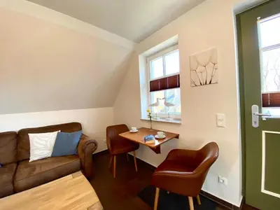 Ein Sitzbereich in der Unterkunft Die Kleine Ferienwohnung