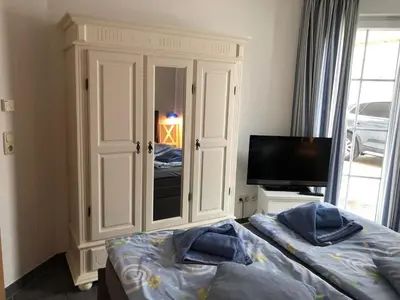 Ein Bett oder Betten in einem Zimmer der Unterkunft Strandmuschel