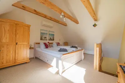 Ein Bett oder Betten in einem Zimmer der Unterkunft Amelie