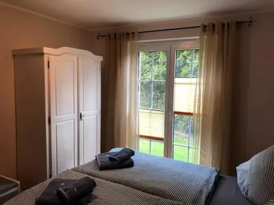 Ein Bett oder Betten in einem Zimmer der Unterkunft Nele 02