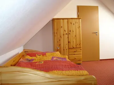 Ein Bett oder Betten in einem Zimmer der Unterkunft Blick ins Grüne