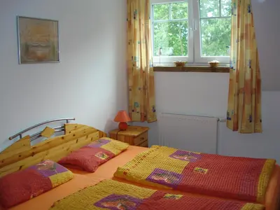 Ein Bett oder Betten in einem Zimmer der Unterkunft Blick ins Grüne