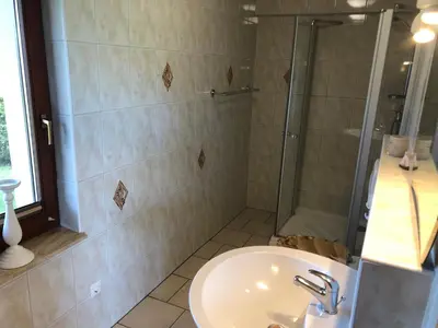 Ein Badezimmer in der Unterkunft 