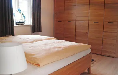 Ein Bett oder Betten in einem Zimmer der Unterkunft 2 Bedroom Cozy Home In Fuhlendorf