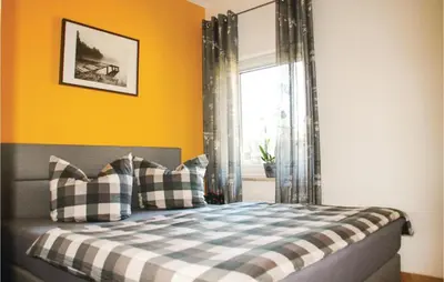 Ein Bett oder Betten in einem Zimmer der Unterkunft Stunning Home In Fuhlendorf With Wifi