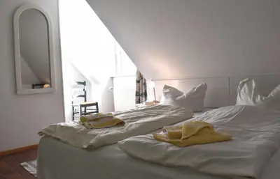 Ein Bett oder Betten in einem Zimmer der Unterkunft Resi M5