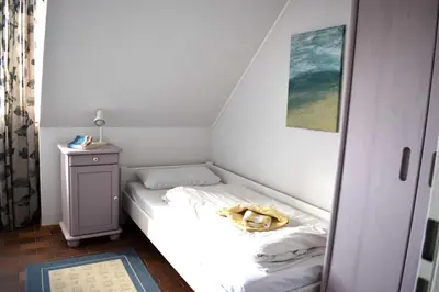 Ein Bett oder Betten in einem Zimmer der Unterkunft Resi M5